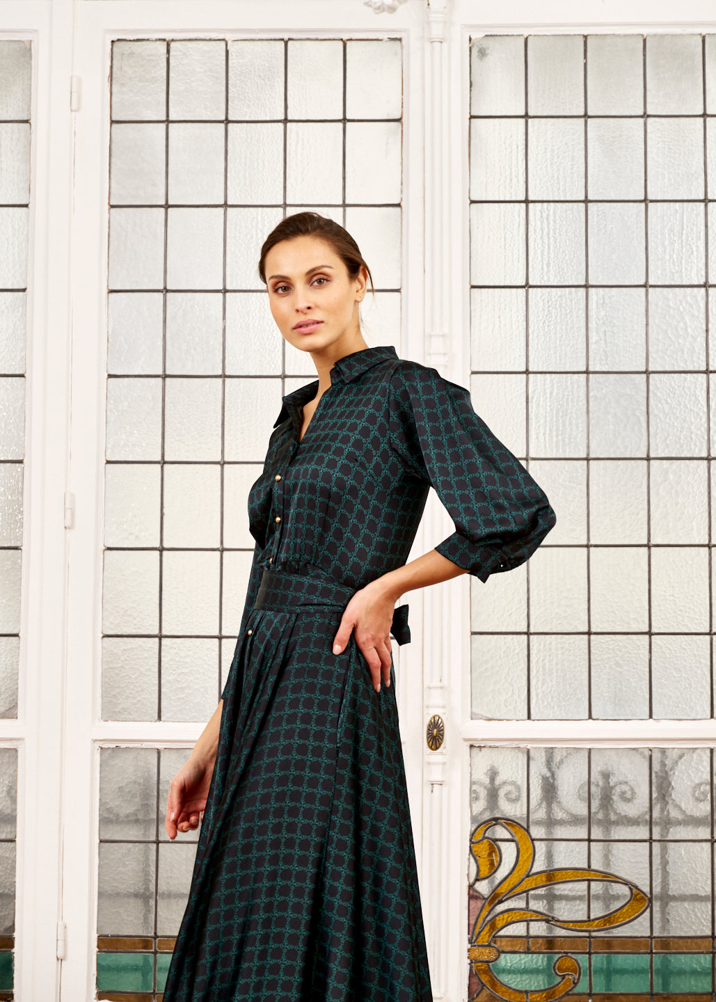 French woman models green print maxi dress