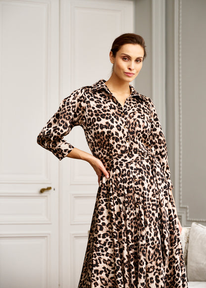 Woman models French women’s leopard print dress