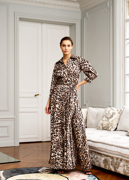 Woman models Parisian leopard maxi dress